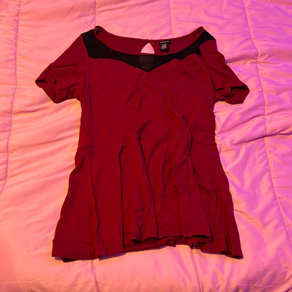 Torrid top with black mesh at top. Mint condition!